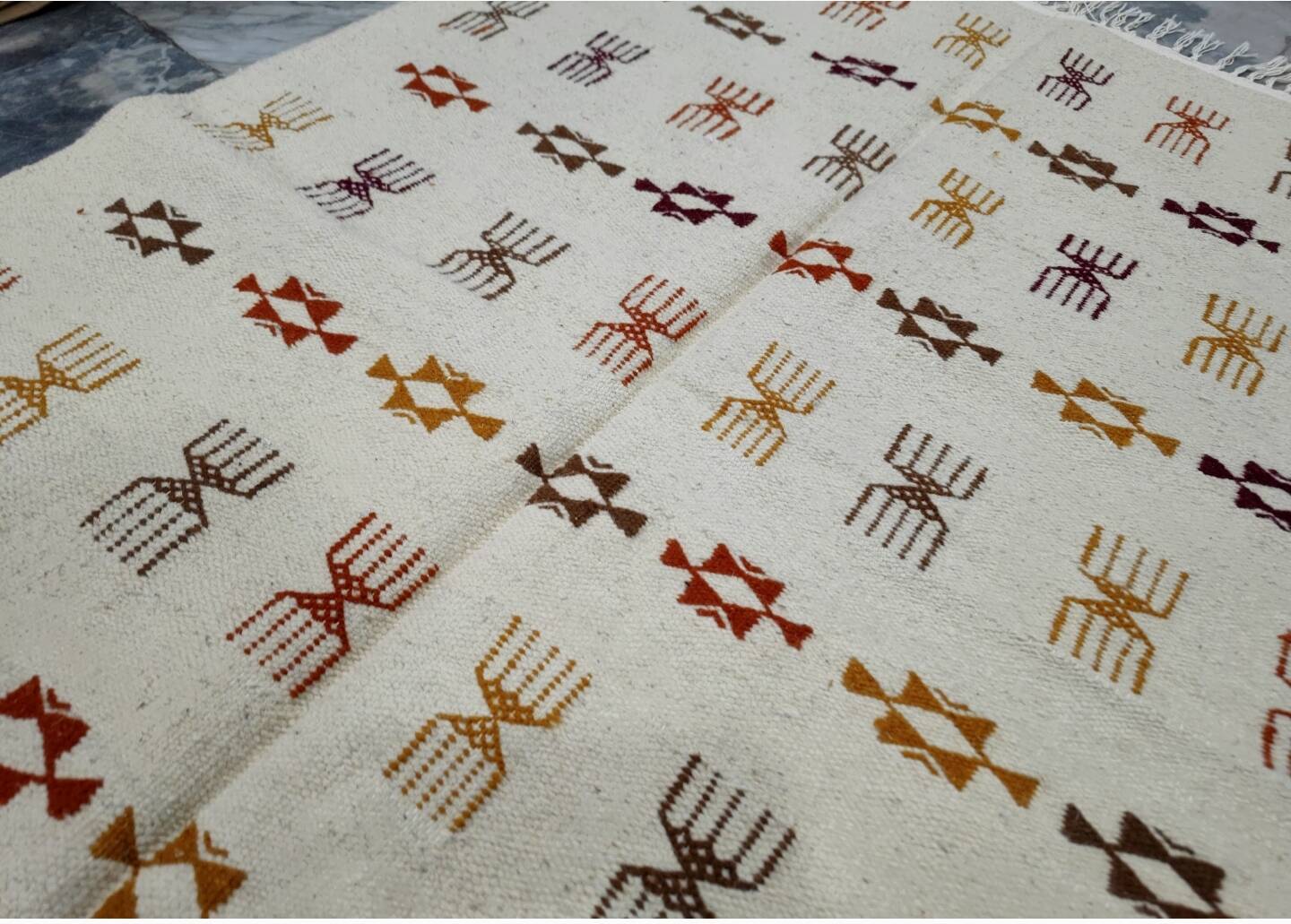 Handmade Berber patterned rug in natural wool