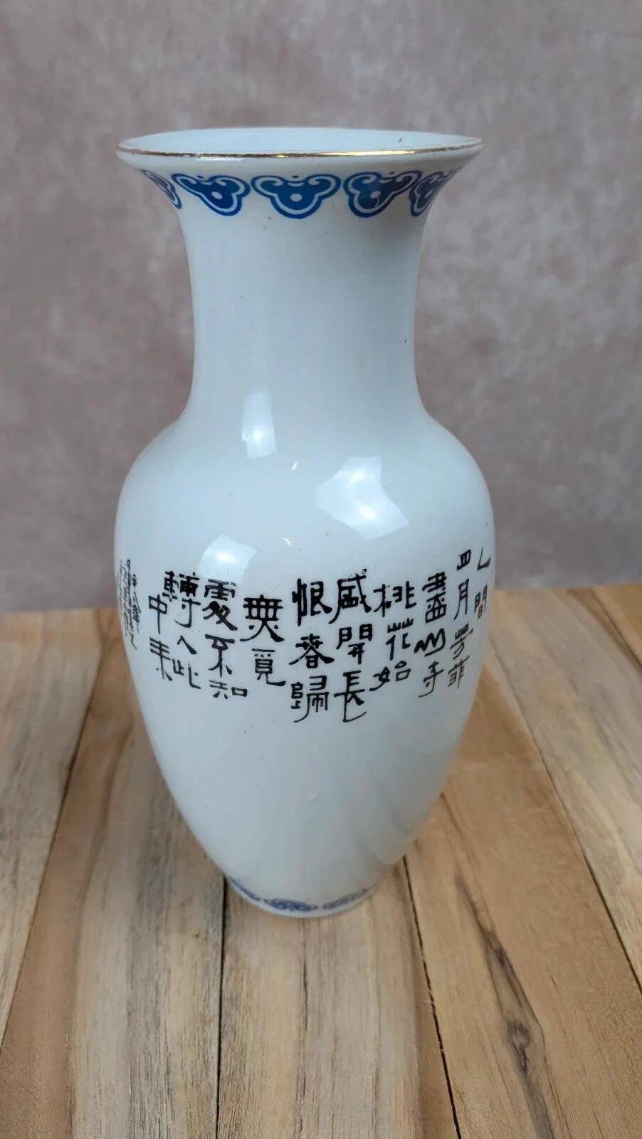 Asian vase decorated with peacock in porcelain