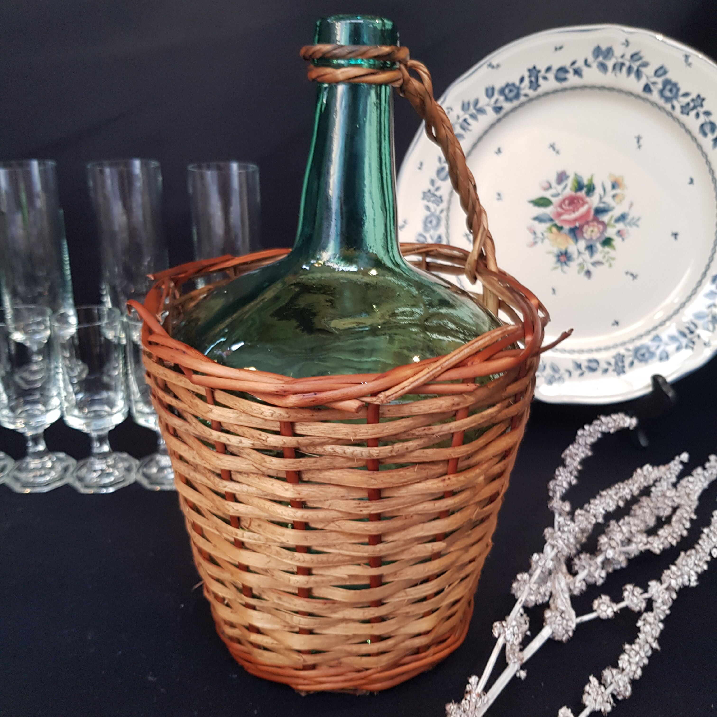 glass and rattan bottle