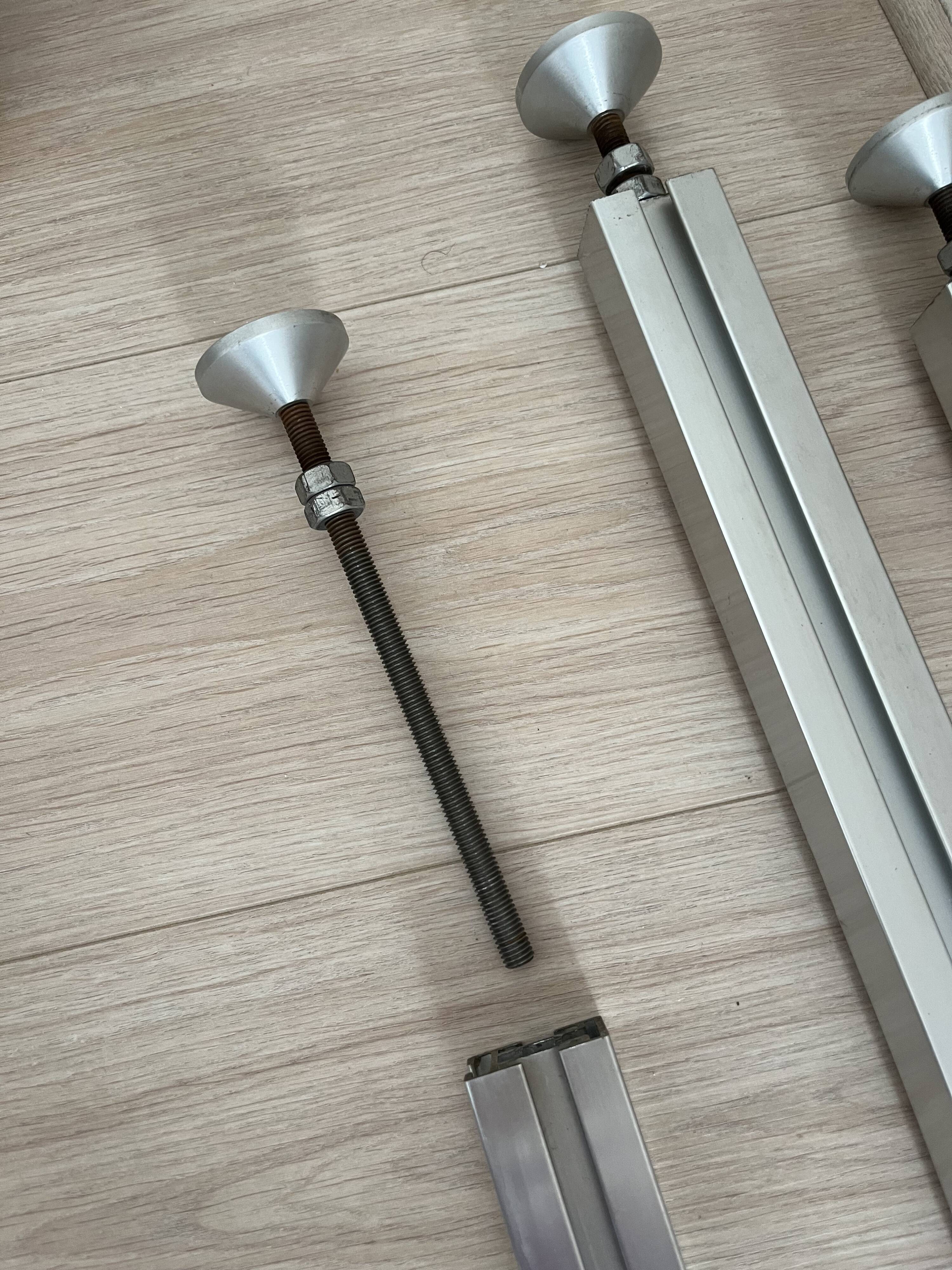 Modular bookcase in aluminum and smoked plexiglass