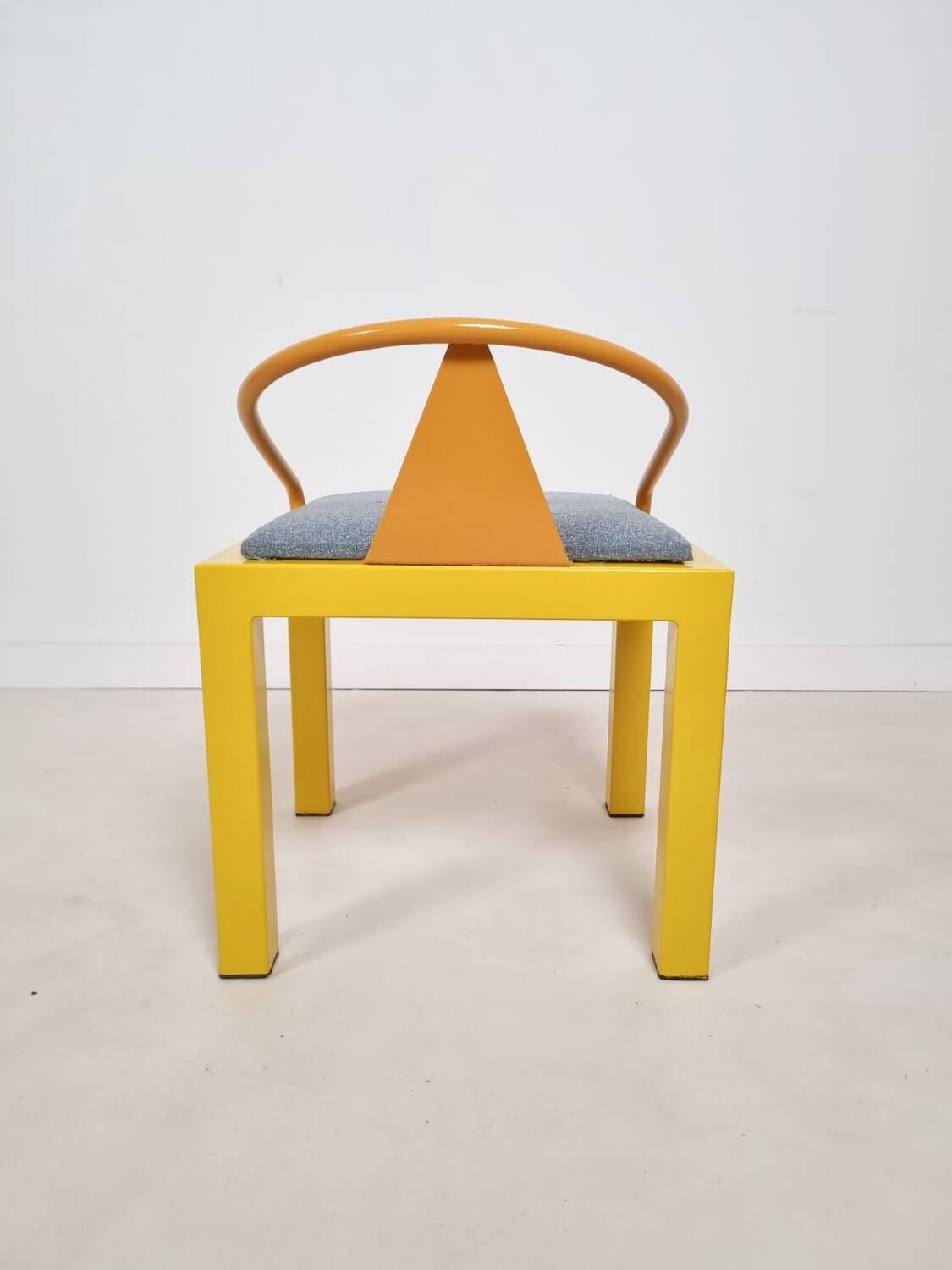 Memphis style chair in the style of Michele De Luchini
