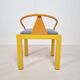 Memphis style chair in the style of Michele De Luchini