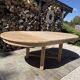 Round solid oak table with extensions, maximum 220cm.