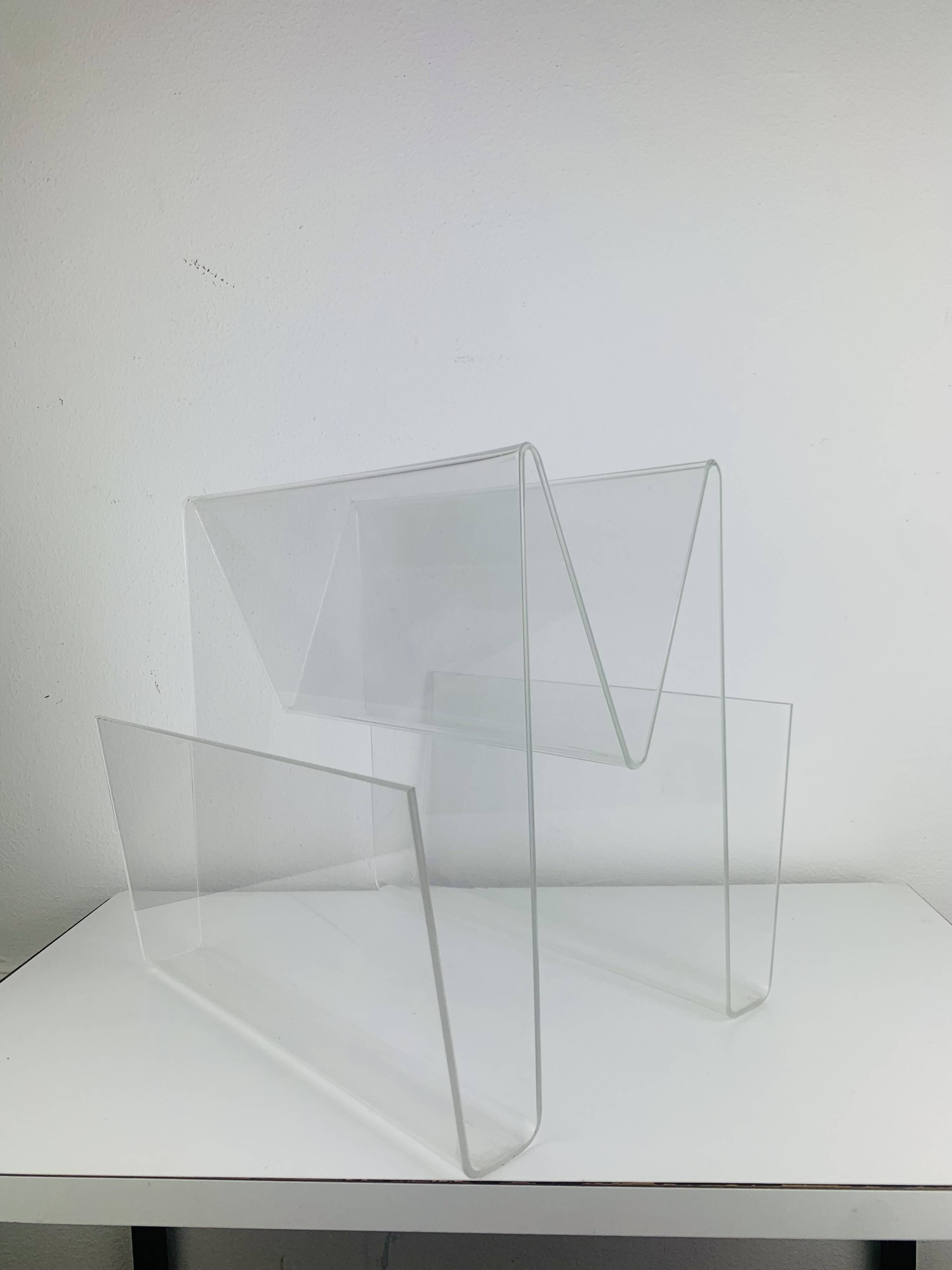 Acrylic magazine rack from the 70s.