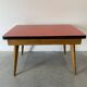 Table à rallonges en Formica et pieds bois