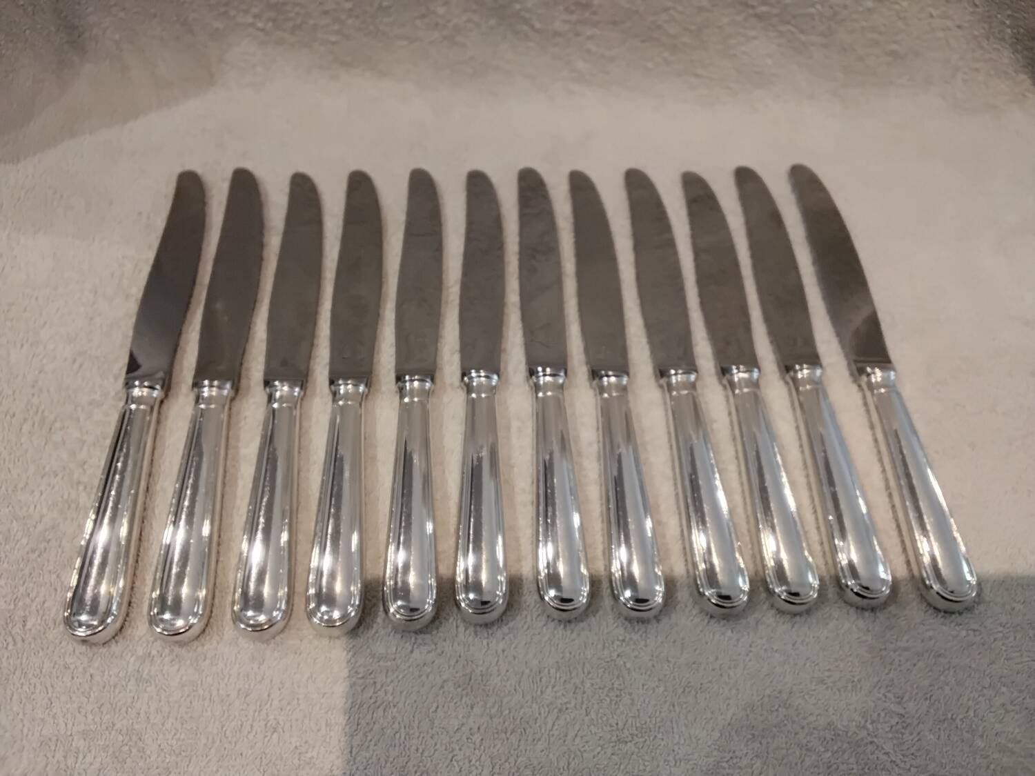12 silver-plated table knives by Christofle, Albi pattern