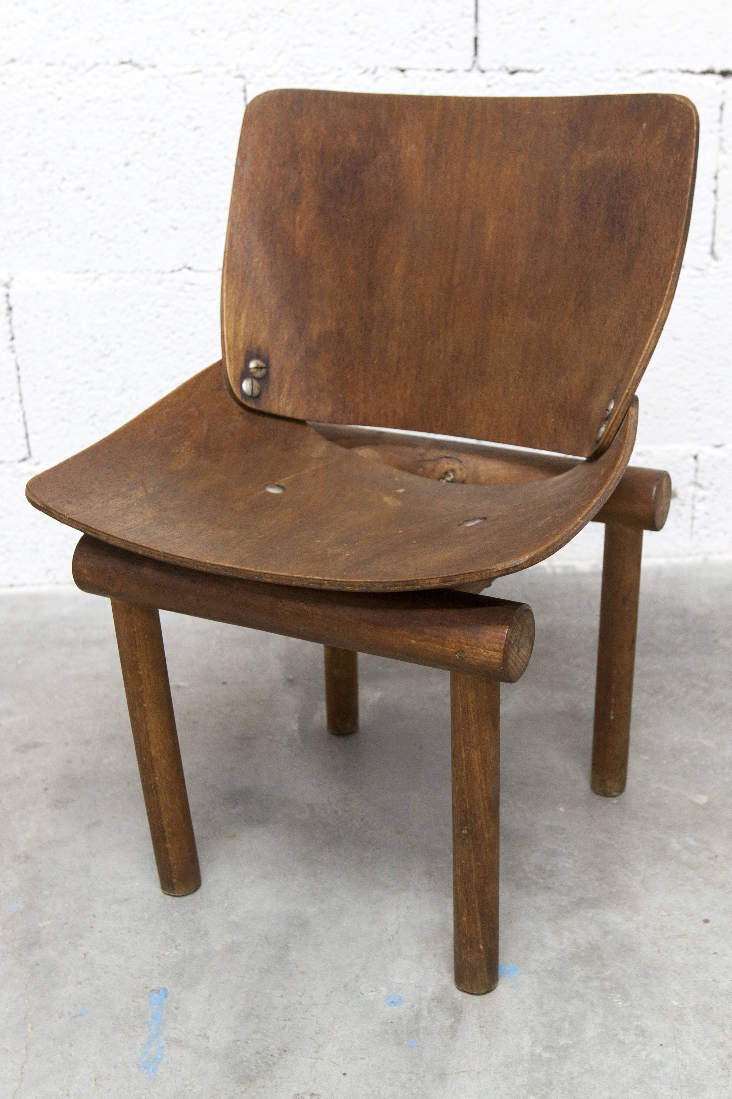 Atypical 1960s curved wood children's chair