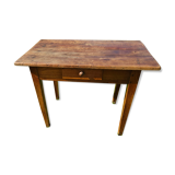 Wooden table with a drawer