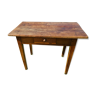 Wooden table with a drawer