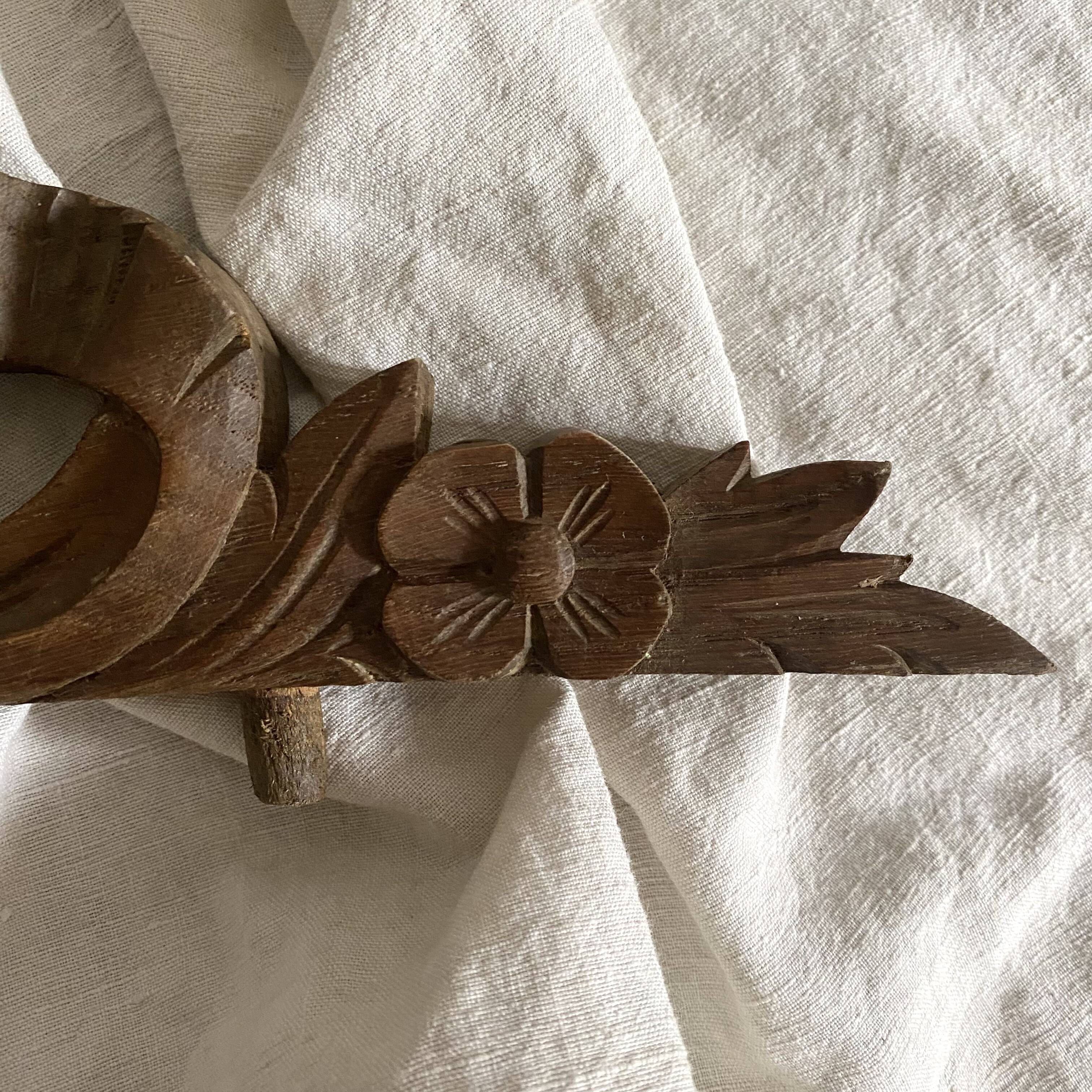Antique carved wooden ribbon pediment