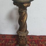 Twisted saddle column in gilded plaster