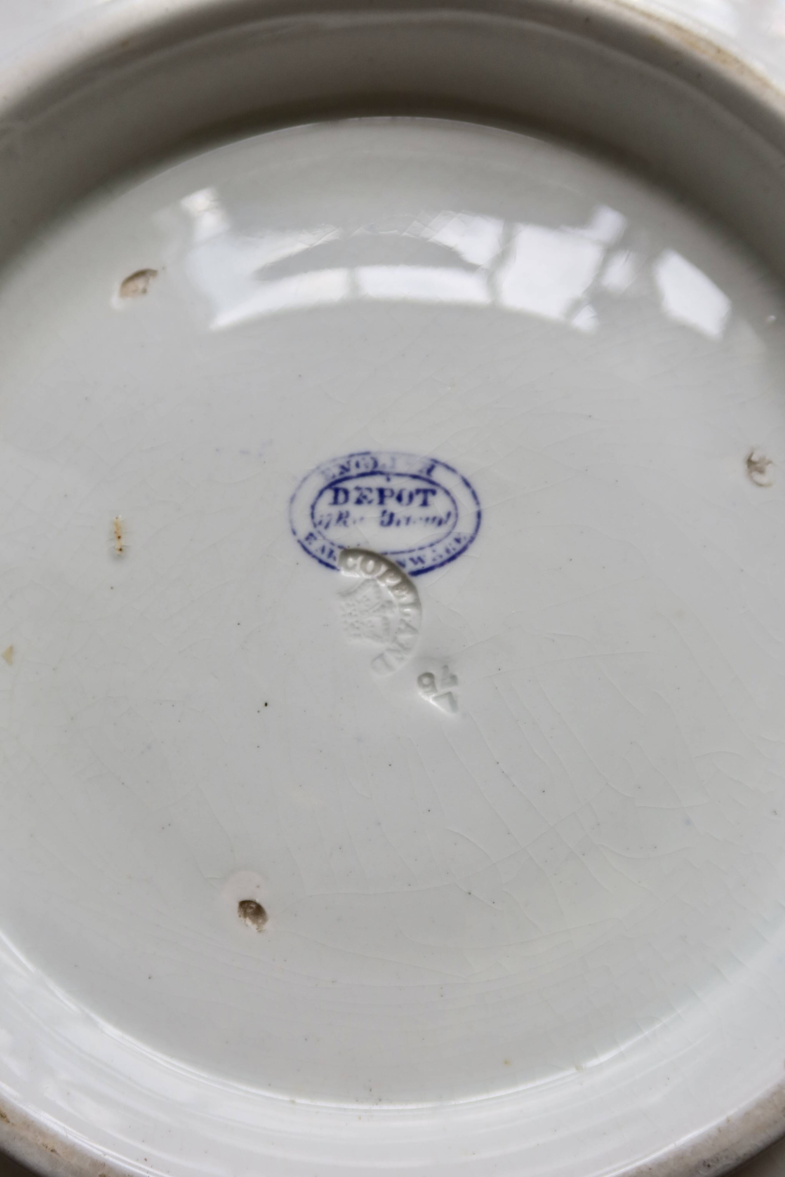 Old basin in white and purple earthenware - Floral decoration