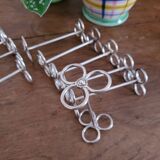 Set of 12 silver Cailar-Bayard knife rests