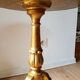 Golden wood tripod pedestal table