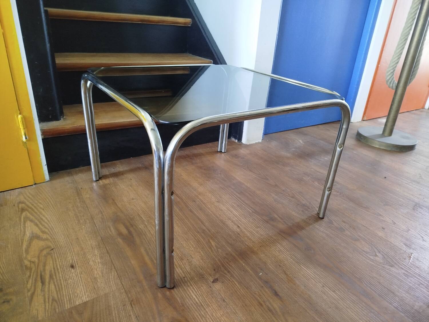 Italian design coffee table with chrome metal and smoked glass from the 1970s.