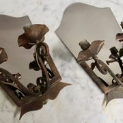 Pair of Art Deco wrought iron and smoked glass wall lights