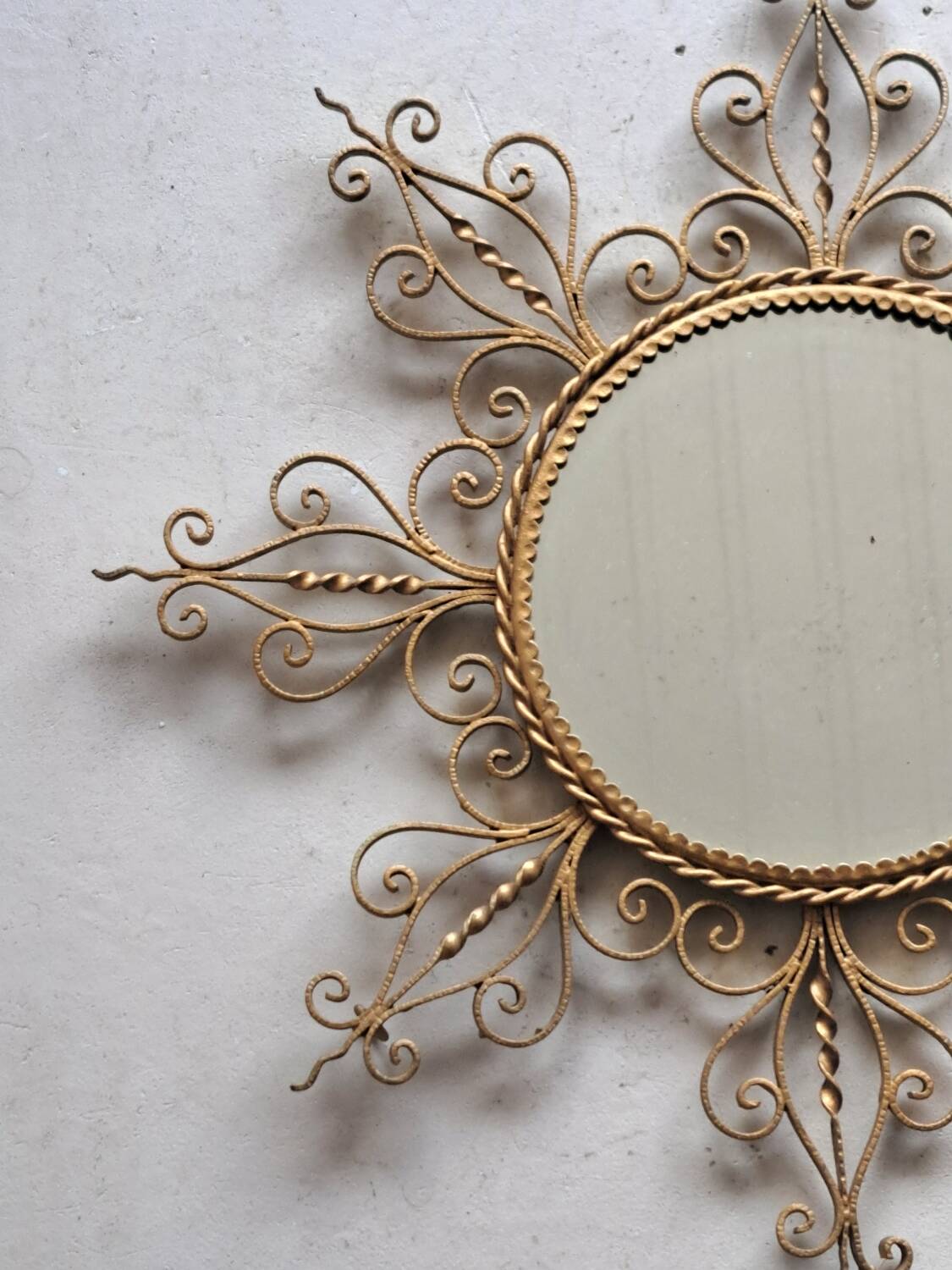 Vintage gold metal sun mirror