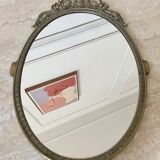 Miroir ovale en laiton doré