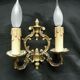 Pair of bronze double-arm appliques