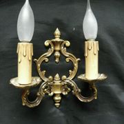 Pair of bronze double-arm appliques