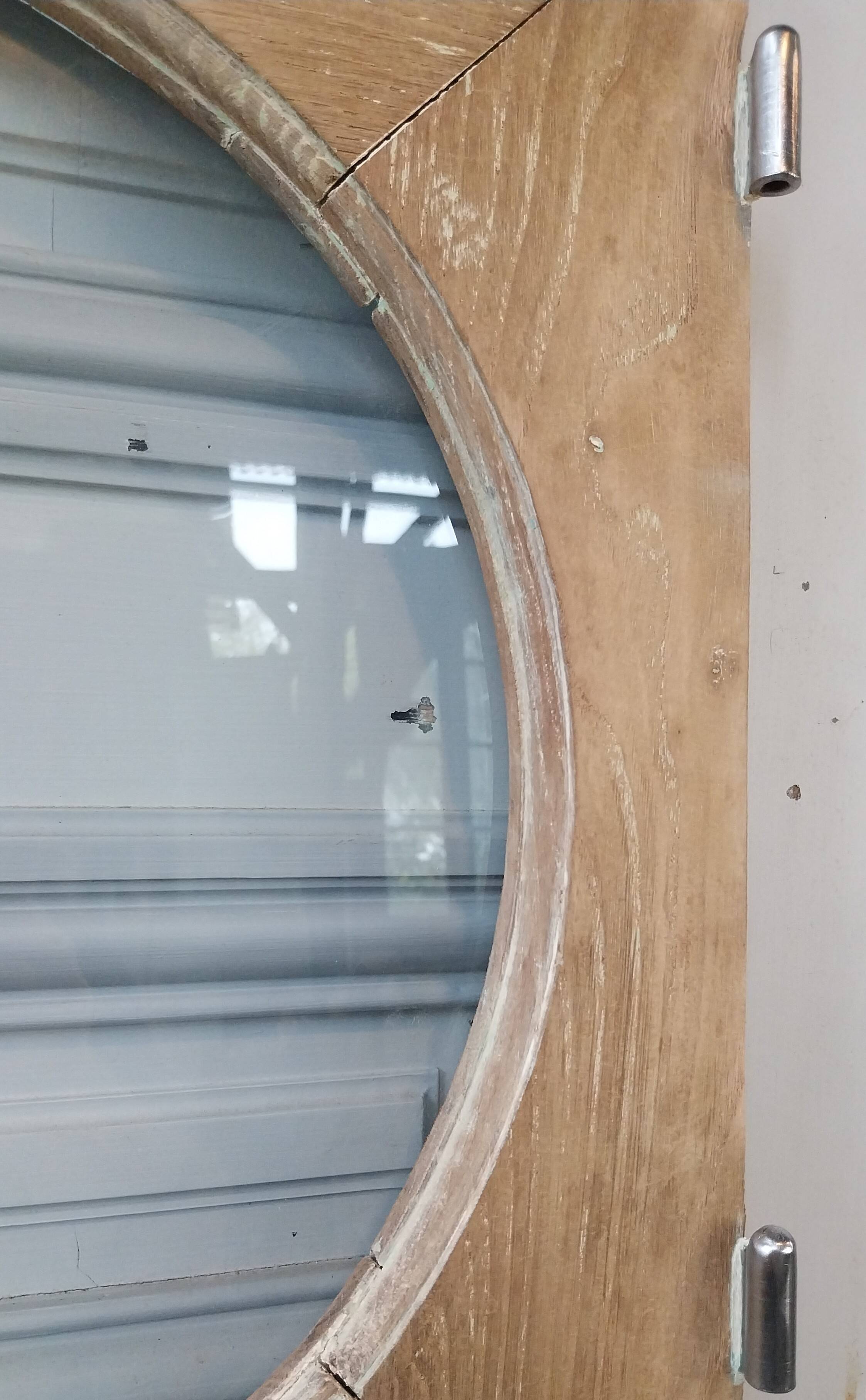 Old bull's-eye window