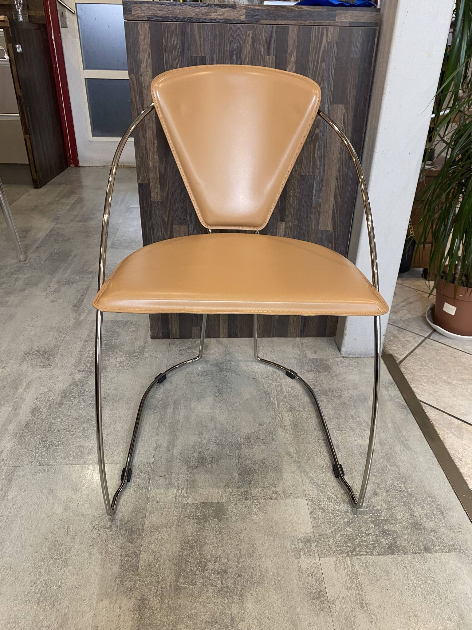 1 Linda armchair chair by Arrben in camel brown leather with a chrome steel frame.