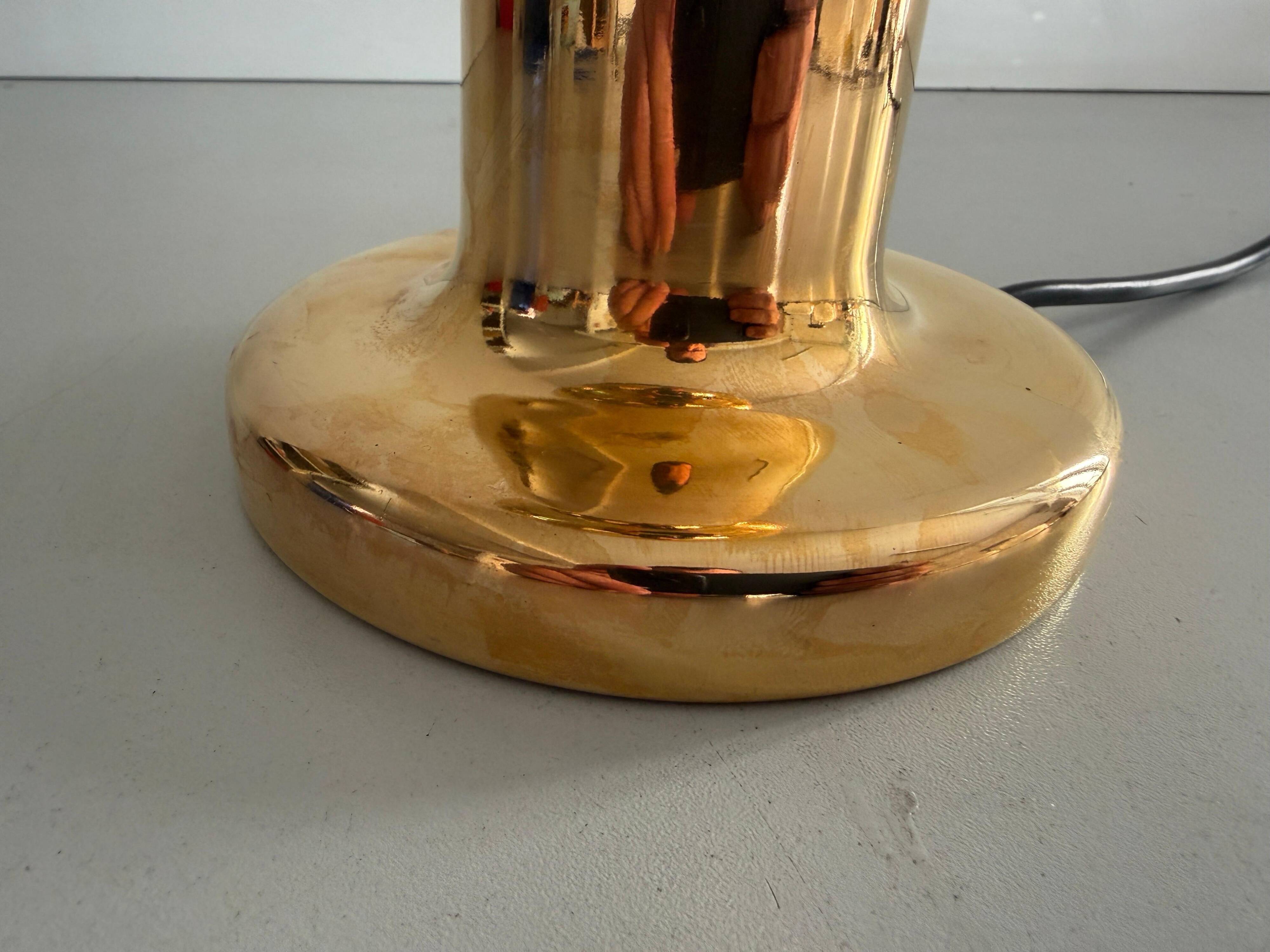 Simple table lamp in gilded porcelain by Philips NTD, 1960s, Germany.