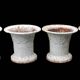 Series of 4 old cast iron vases