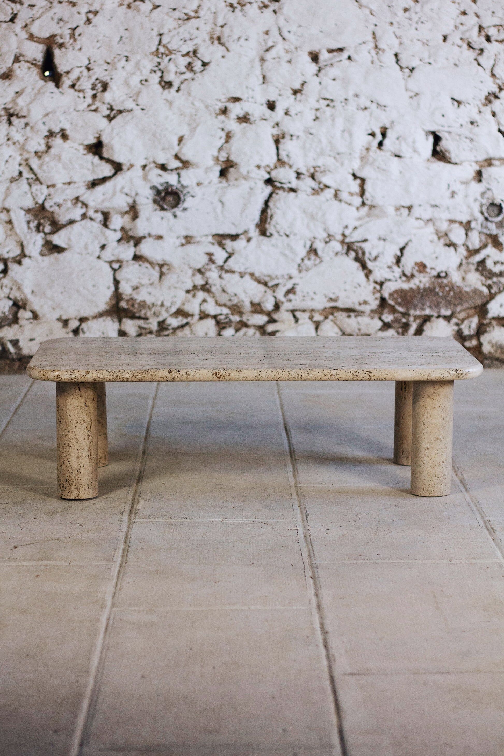 Travertine coffee table in the style of Angelo Mangiarotti, 1970.