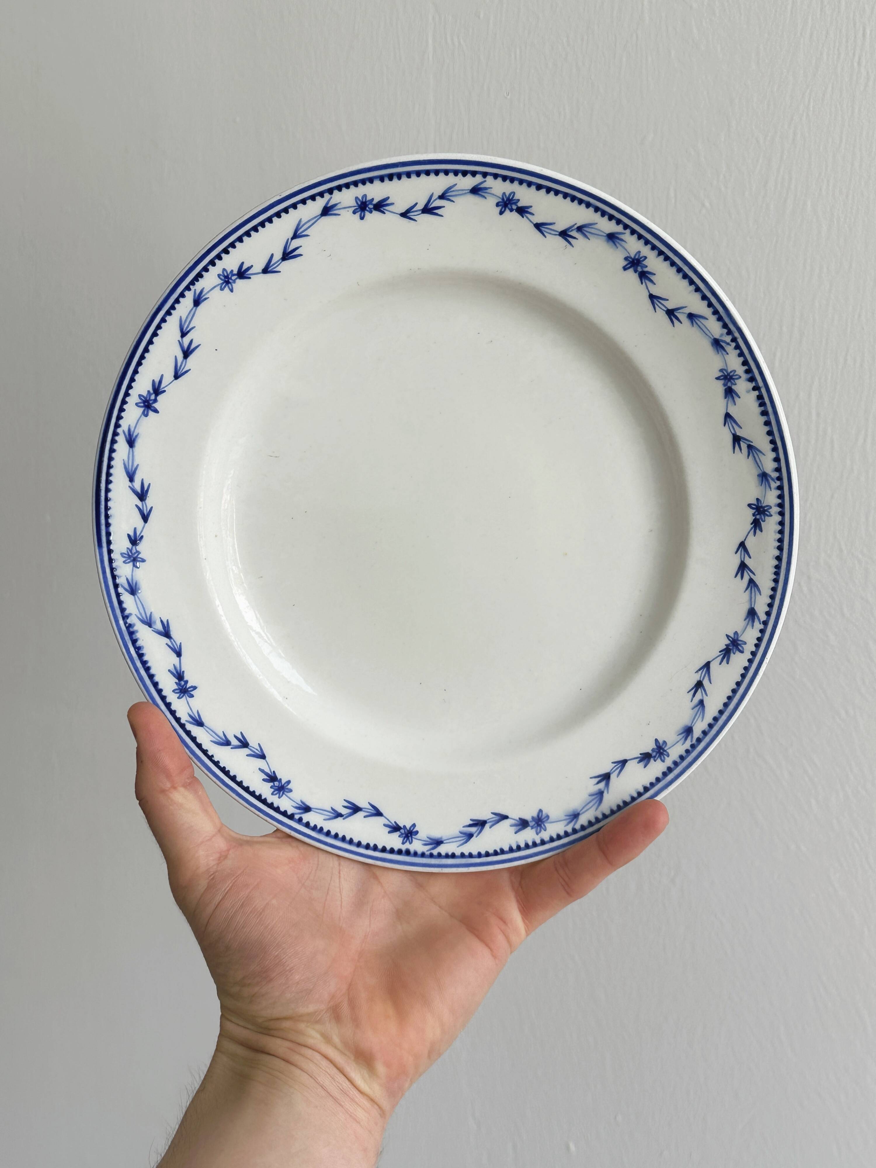 4 antique ceramic plates with blue flowers