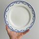 4 antique ceramic plates with blue flowers