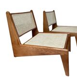 Pair of teak and canning armchairs