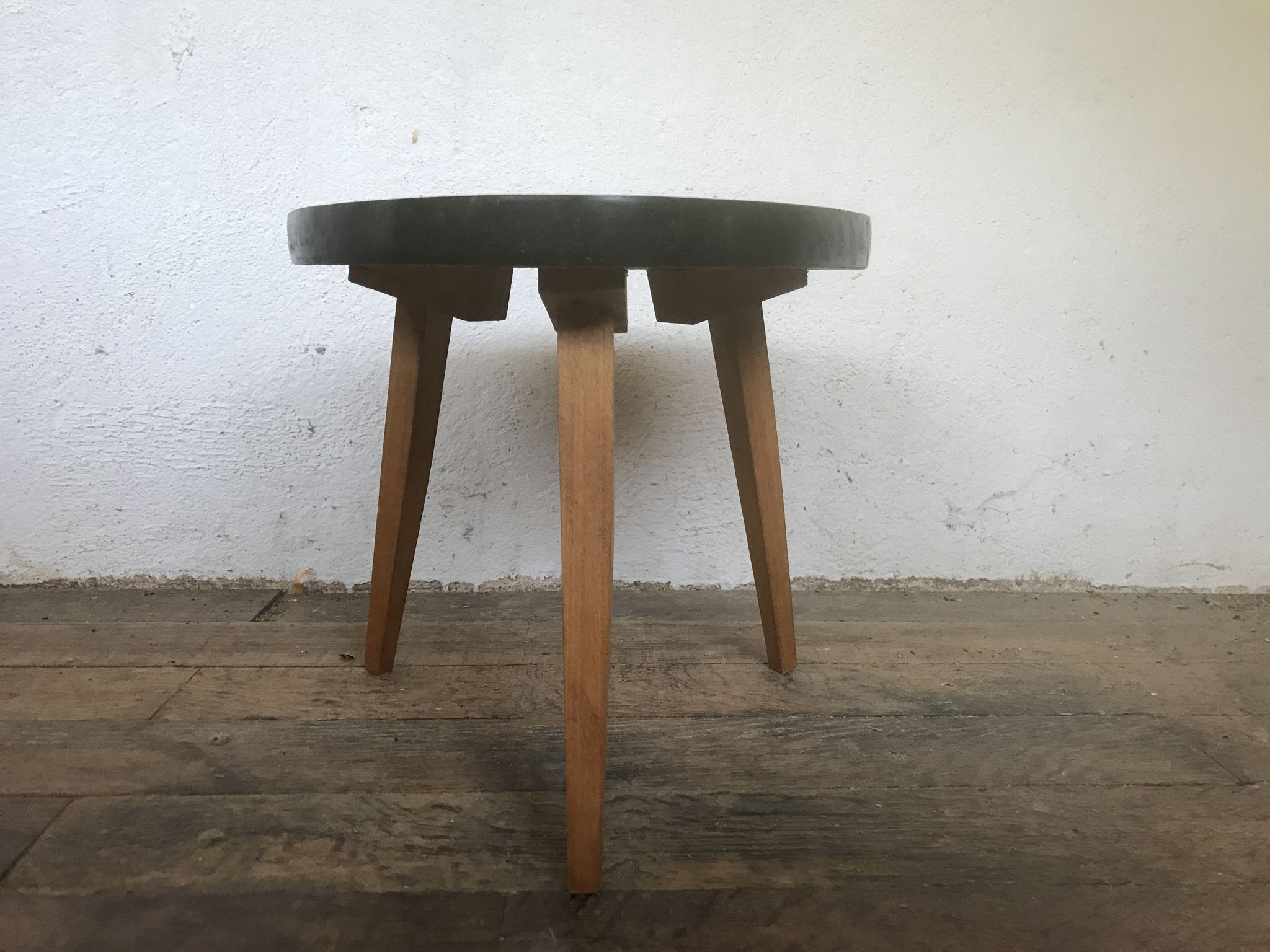 Small triangular table coffee table with a vintage tripod door midcentury plant 1950