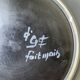 Black ceramic plate from the 60s