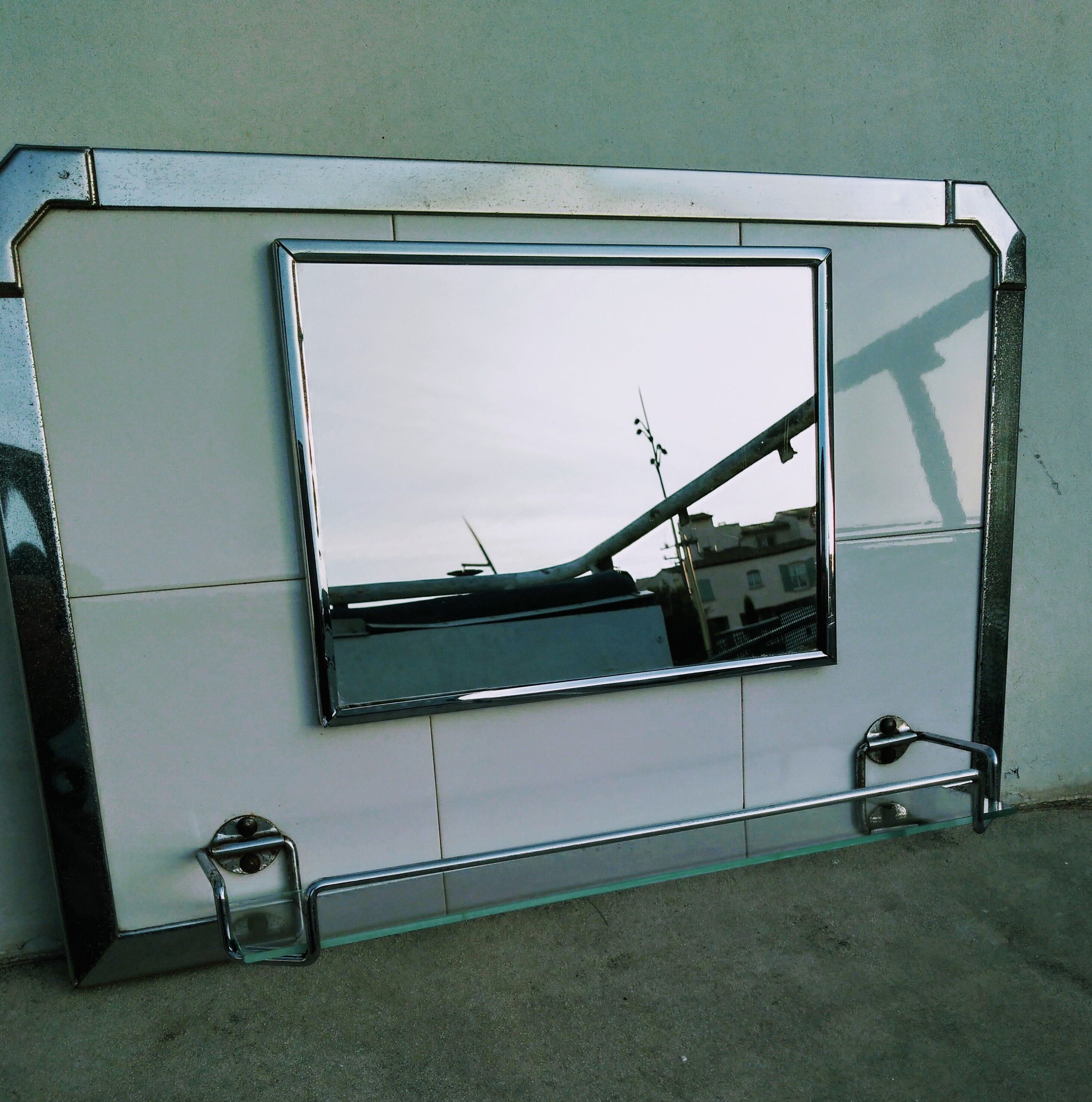 Miroir chrome et carrelage 46x31cm