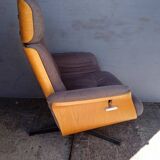 1970 style rotating designer armchair