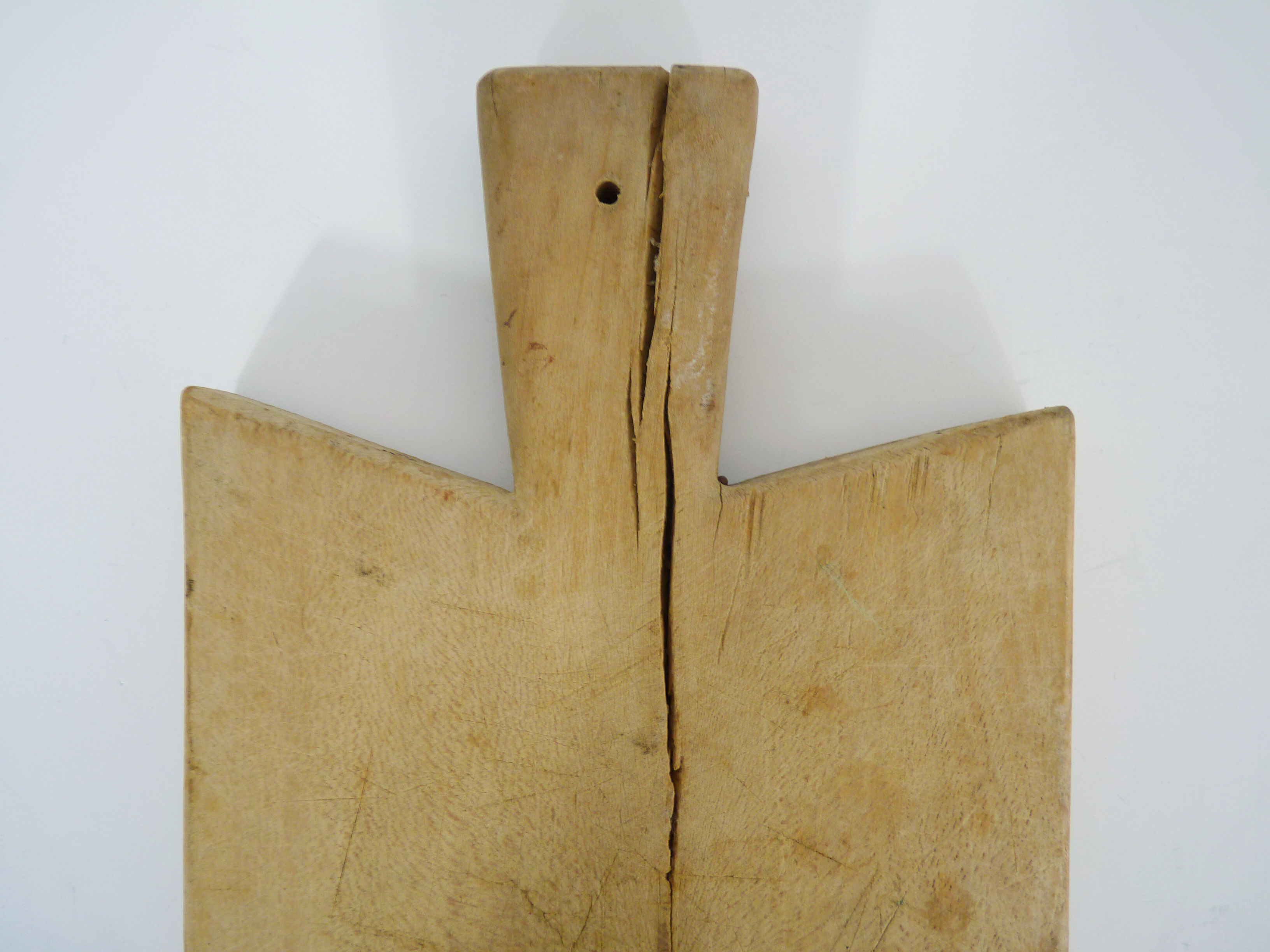 Small and old wooden cutting board. Year 50