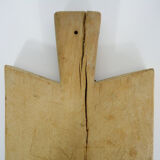 Small and old wooden cutting board. Year 50