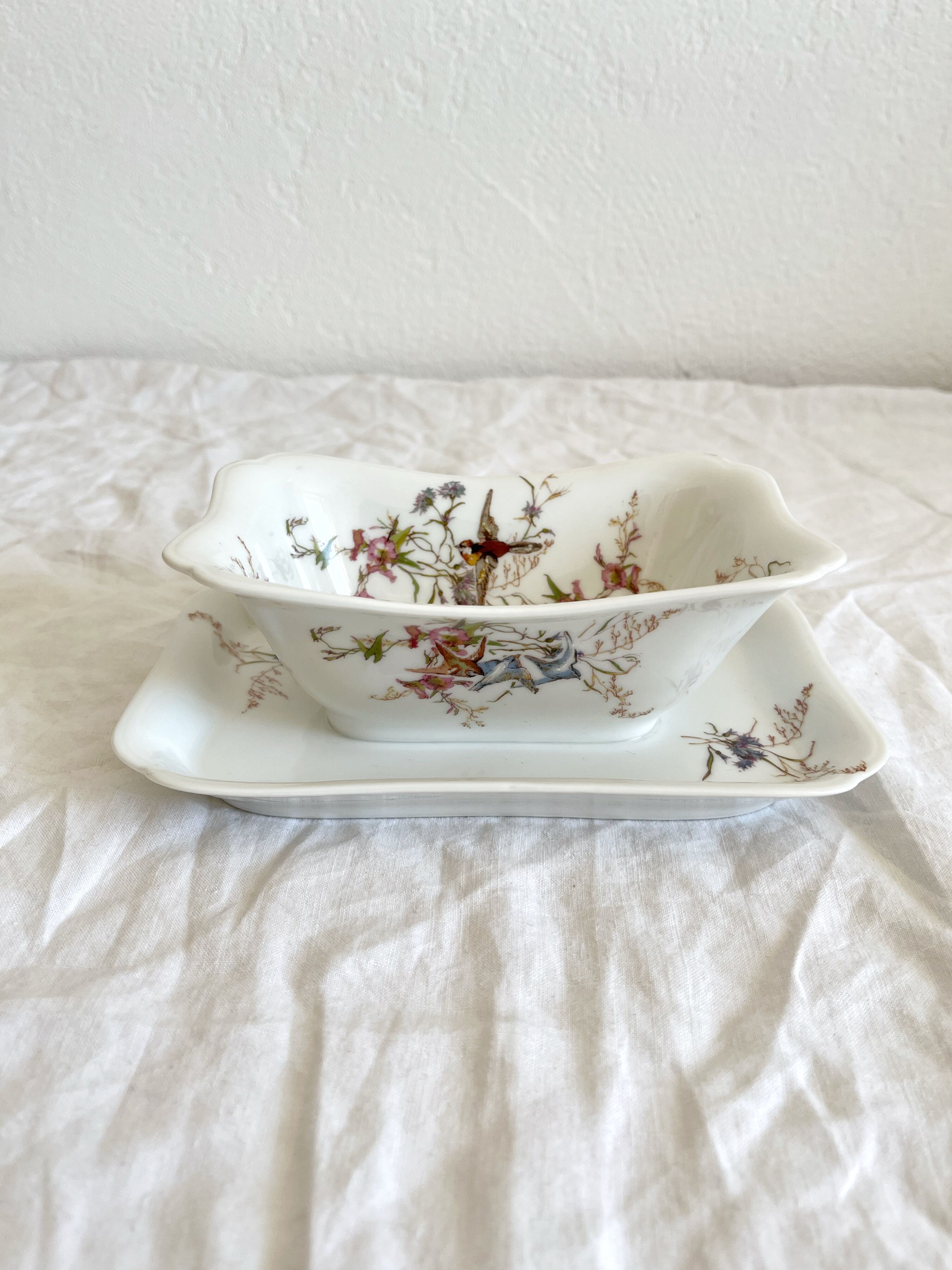 Rectangular sauce boat in Haviland Limoges porcelain with bird decoration