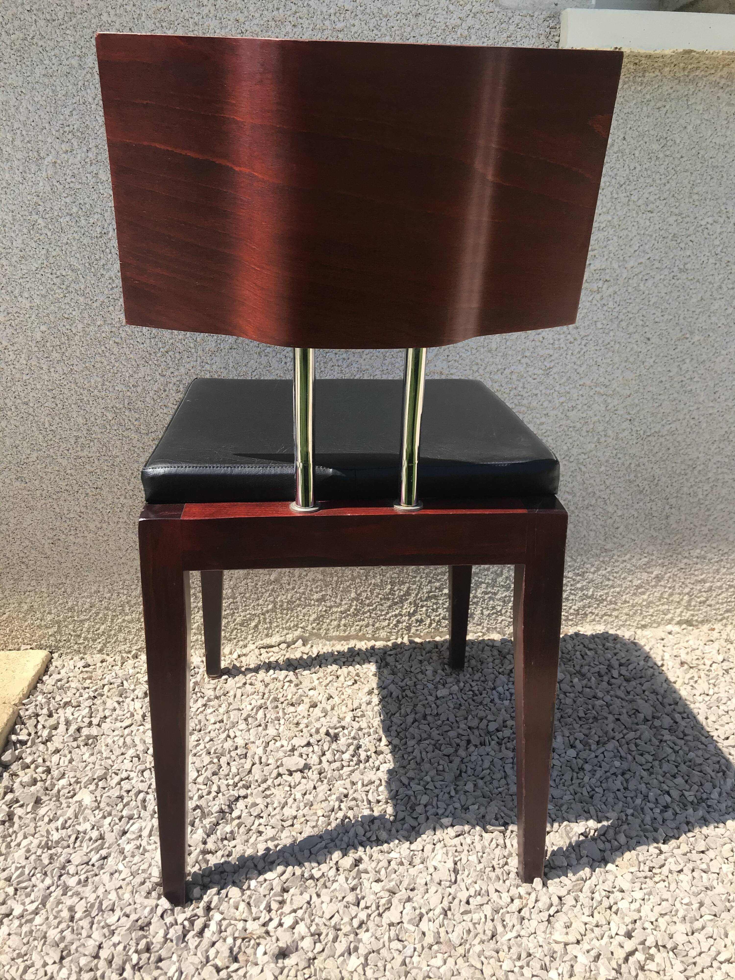 Suite de 9 chaises skaï noir et chrome scandinave