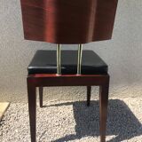 Suite of 9 black skai chairs and scandinavian chrome