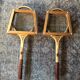 Pair of old wooden tennis rackets with 50s frames