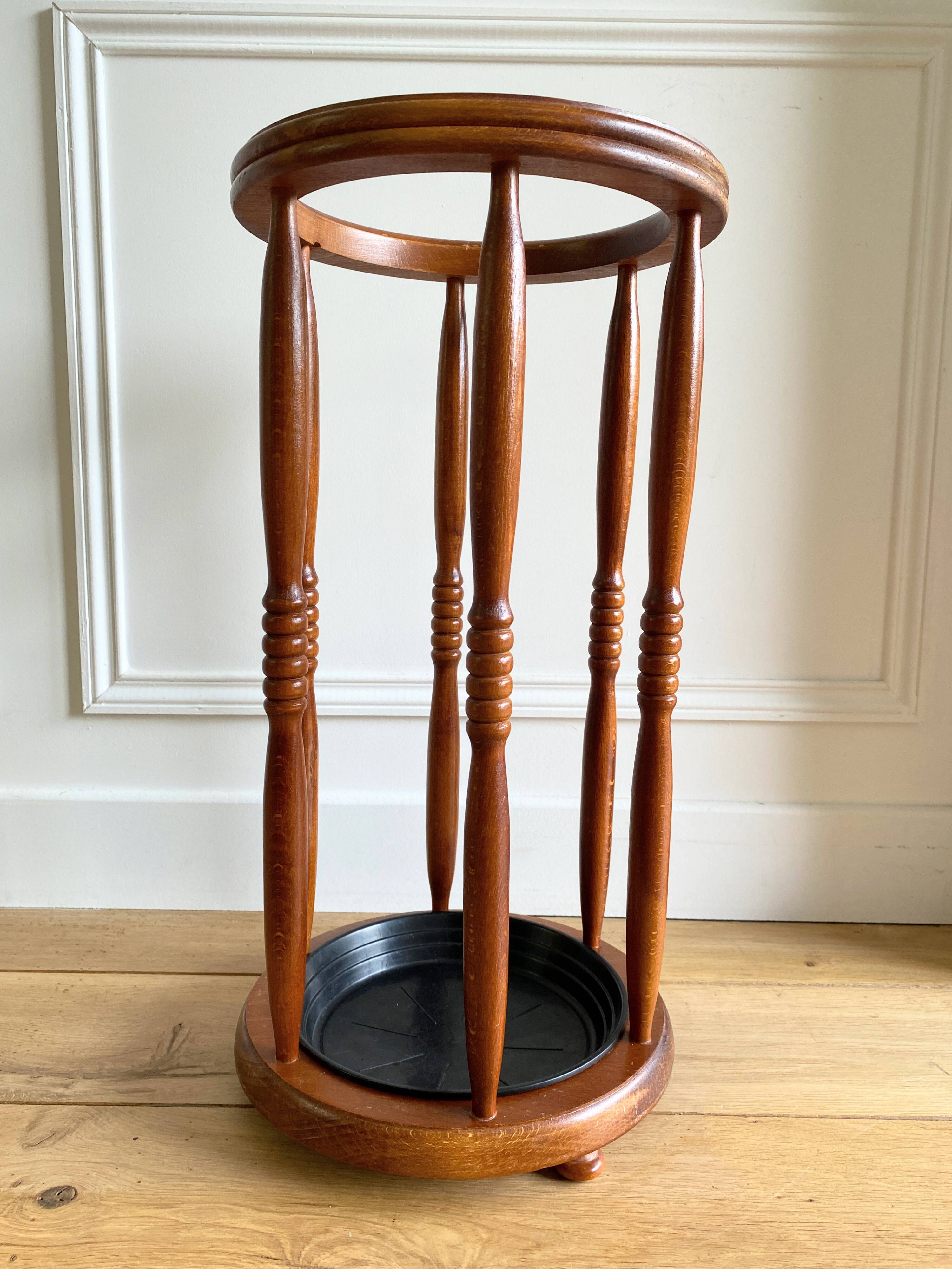 Vintage round wooden umbrella stand