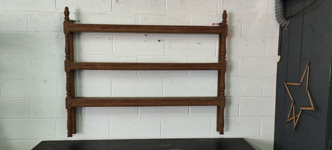 Old oak shelf back of glass counter wall