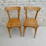 Pair of Baumann bistro chairs in light wood