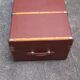 Old trunk, travel suitcase, with carrying handles and interior lockers, wooden reinforcements