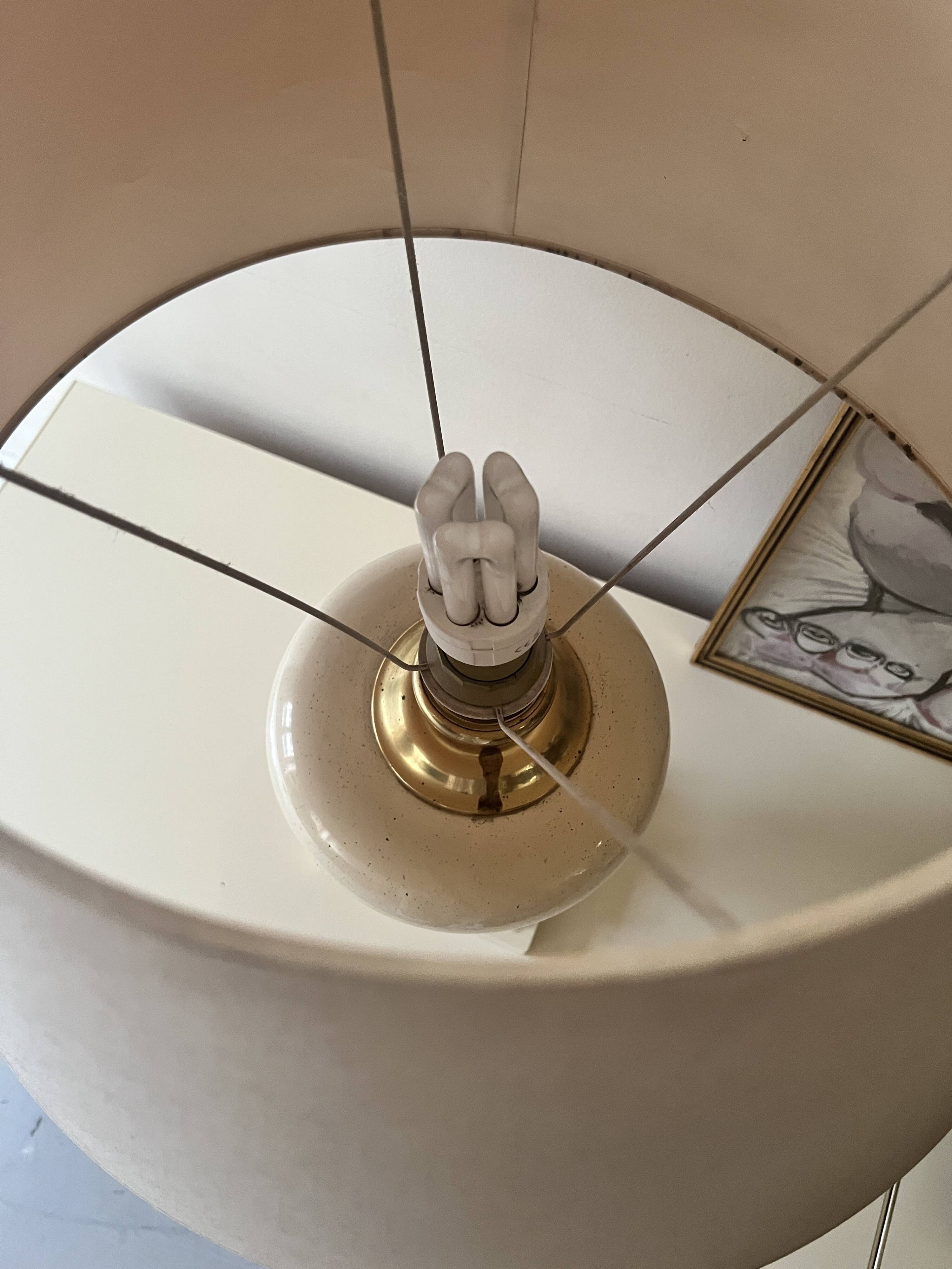 Dolphin lamp model "Oricourt" in ceramic and brass, France 1970.