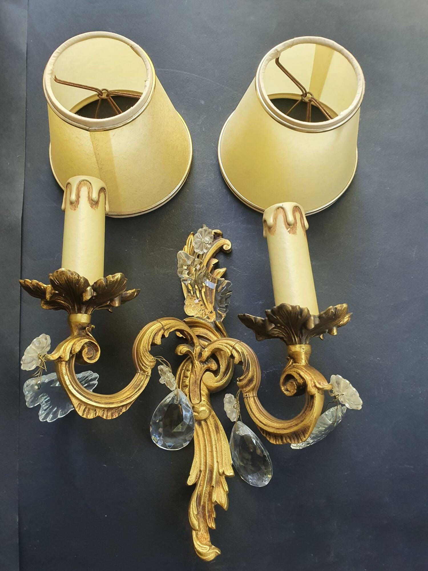 Pair of wall sconces candle holders with antique pendants