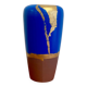 Electric blue and frosted brown decorative vase with gold leaf.
