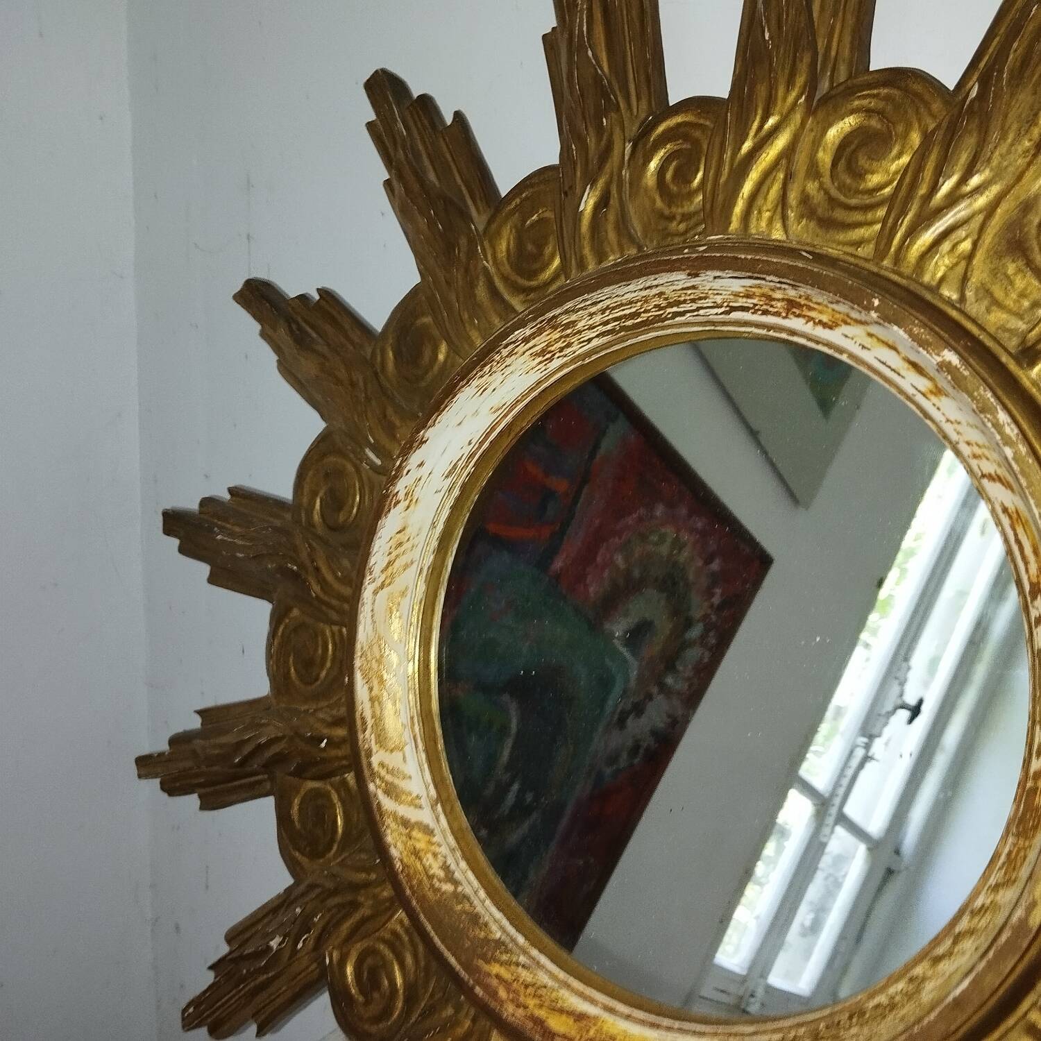 Miroir soleil bois sculpté doré